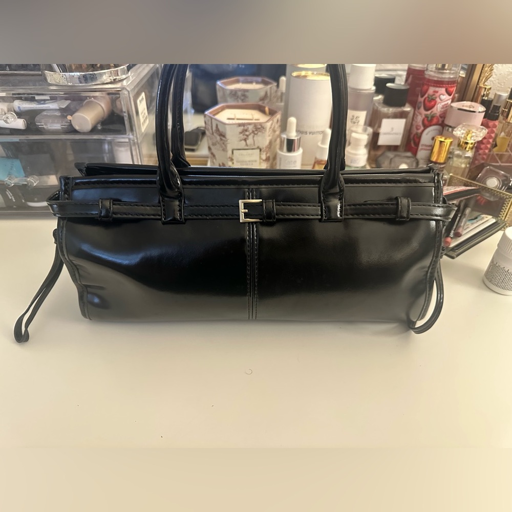 Black belted baguette handbag